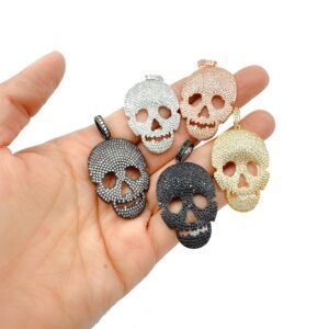 Hand Holding Different Color of Skull head Charm Pendant