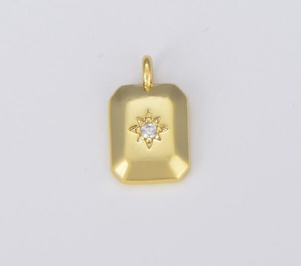 Gold Starburst Tag Charm