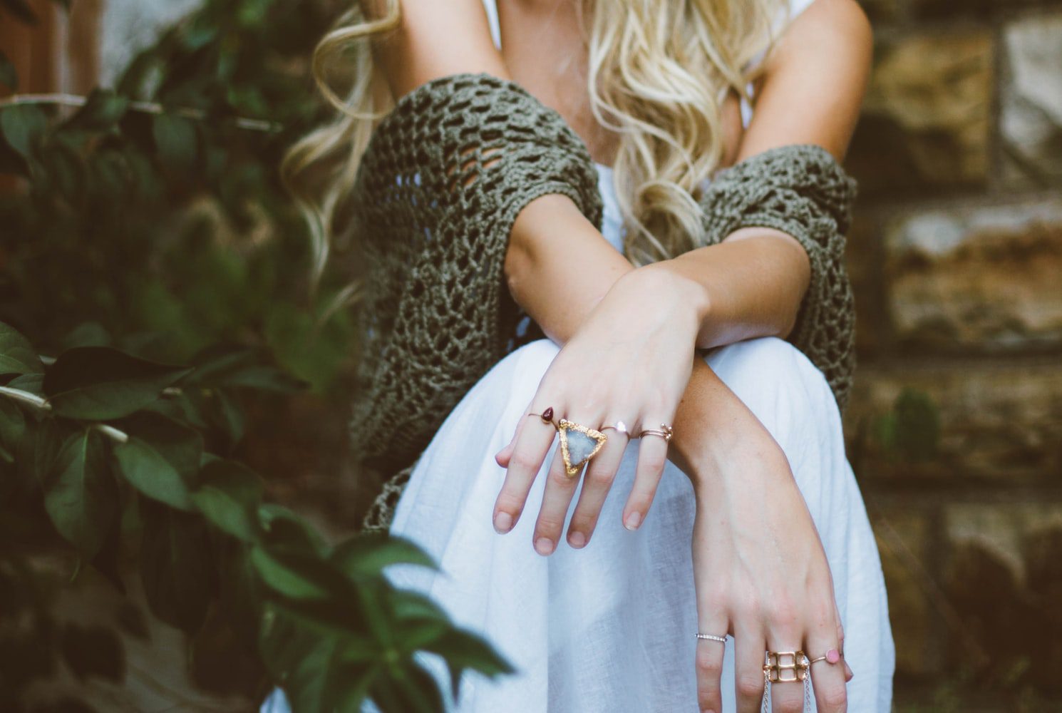 woman with rings on her fingers